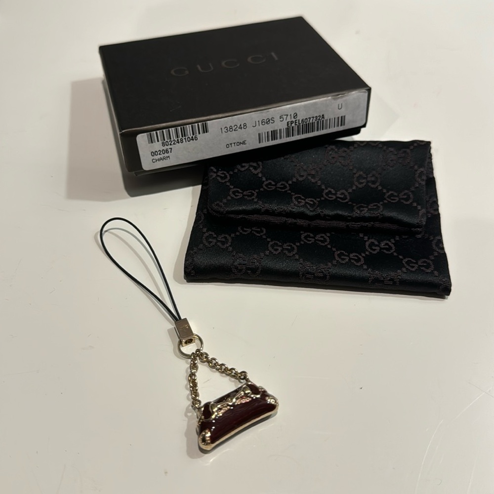 Gucci Authentic Pre Owned Hose Bits Bag Charm with Box and Dust Bag in Burgundy.